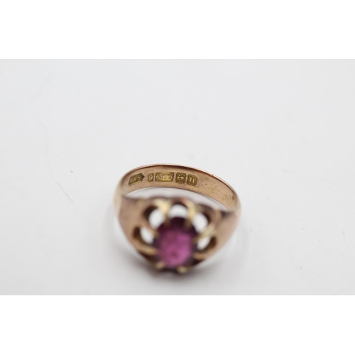 30 - A George V hallmarked Birmingham 9ct gold garnet claw set dress ring, size N and dated 1919 - approx... 