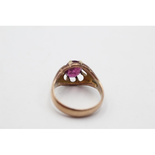 30 - A George V hallmarked Birmingham 9ct gold garnet claw set dress ring, size N and dated 1919 - approx... 