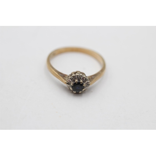 31 - A hallmarked London 9ct gold diamond and sapphire dress ring, size L½ - approx. gross weight 2 grams