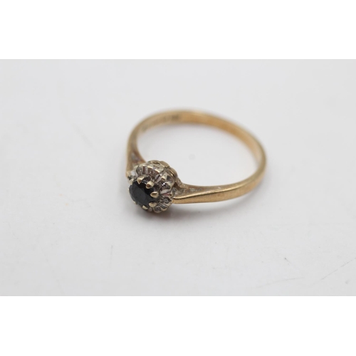 31 - A hallmarked London 9ct gold diamond and sapphire dress ring, size L½ - approx. gross weight 2 grams