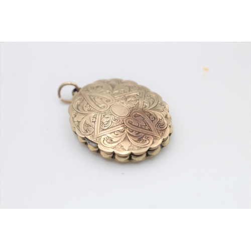 33 - An antique 7ct gold front and back ornate design locket - approx. gross weight 5.9 grams