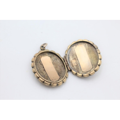 33 - An antique 7ct gold front and back ornate design locket - approx. gross weight 5.9 grams