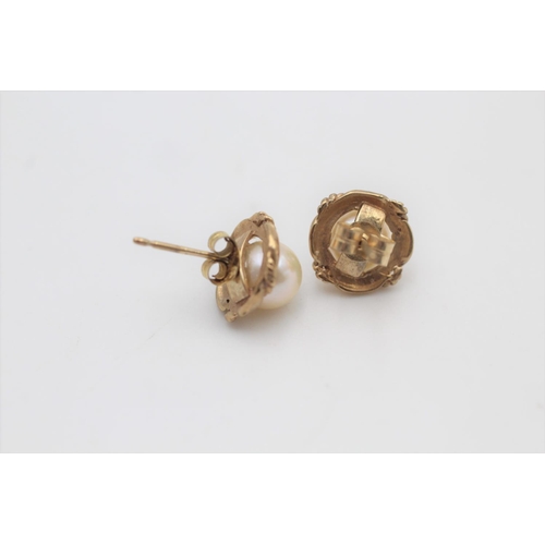 37 - A pair of 9ct gold cultured pearl stud earrings - approx. gross weight 2.3 grams