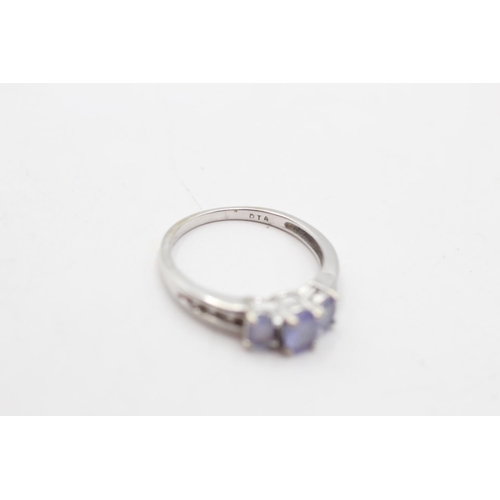 4 - A 9ct white gold tanzanite and diamond shoulder trilogy ring, size L - approx. gross weight 1.8 gram... 