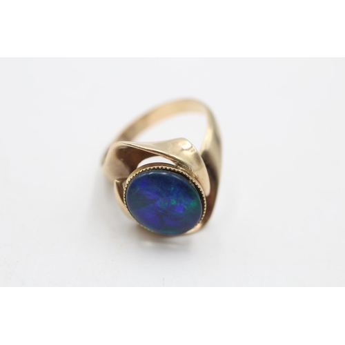 42 - A 9ct gold opal cocktail ring, size P½ - approx. gross weight 4.5 grams