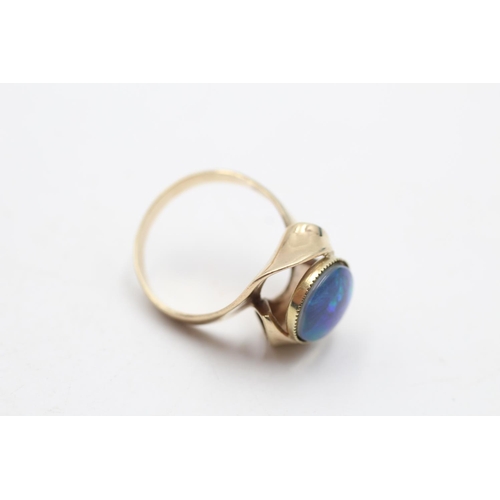 42 - A 9ct gold opal cocktail ring, size P½ - approx. gross weight 4.5 grams