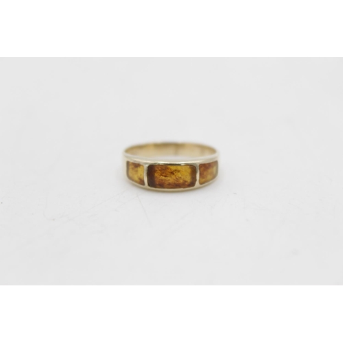 44 - Two 9ct gold dress rings, one amazonite and one amber, both size P½ - approx. gross weight 5.7 grams