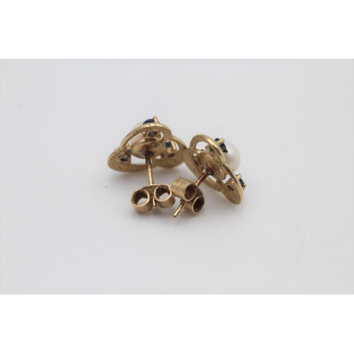 49 - A pair of 9ct gold sapphire and cultured pearl stud earrings - approx. gross weight 2.5 grams