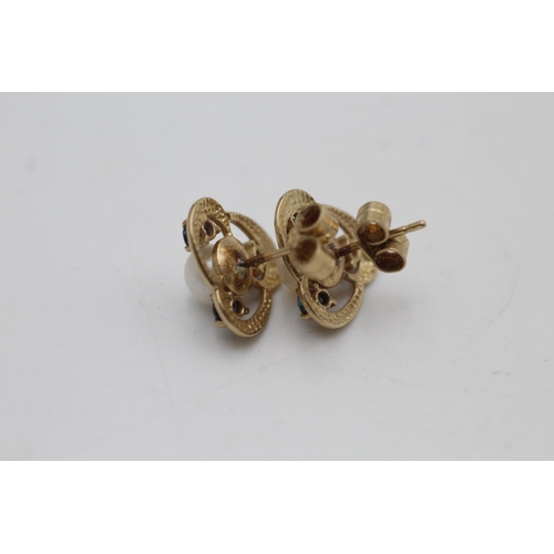 49 - A pair of 9ct gold sapphire and cultured pearl stud earrings - approx. gross weight 2.5 grams