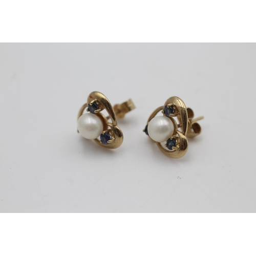 49 - A pair of 9ct gold sapphire and cultured pearl stud earrings - approx. gross weight 2.5 grams