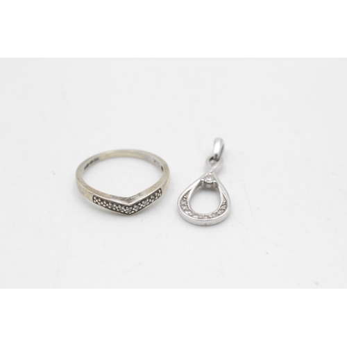 50 - Two pieces of 9ct white gold diamond jewellery, one hallmarked Sheffield wishbone ring size O and on... 