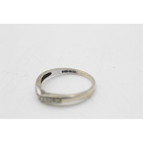 50 - Two pieces of 9ct white gold diamond jewellery, one hallmarked Sheffield wishbone ring size O and on... 