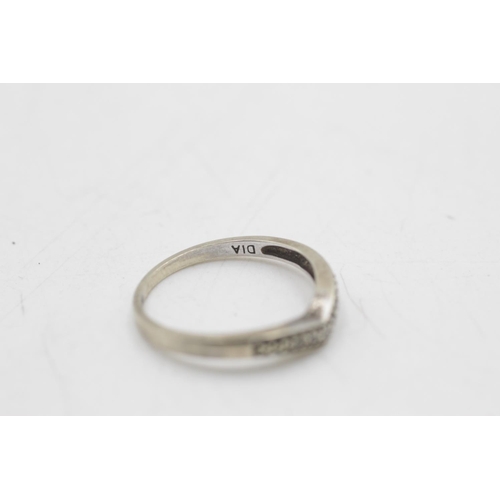 50 - Two pieces of 9ct white gold diamond jewellery, one hallmarked Sheffield wishbone ring size O and on... 