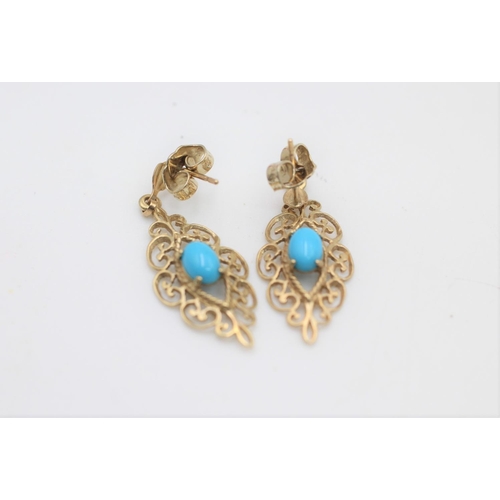 56 - A pair of 9ct gold turquoise ornate drop earrings - approx. gross weight 2 grams