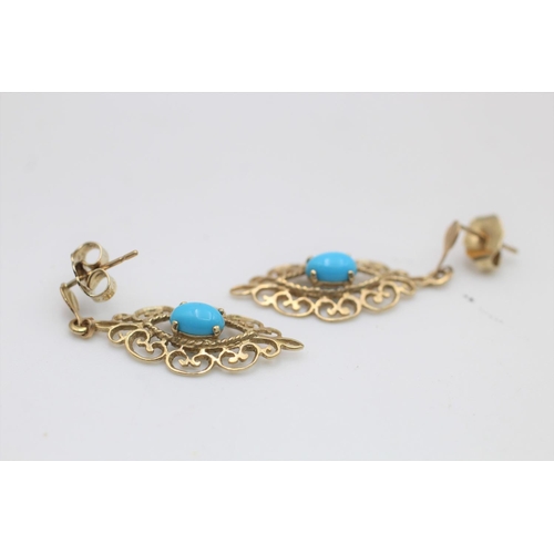 56 - A pair of 9ct gold turquoise ornate drop earrings - approx. gross weight 2 grams