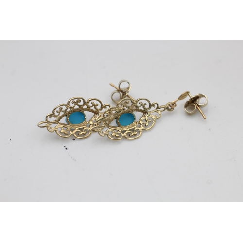 56 - A pair of 9ct gold turquoise ornate drop earrings - approx. gross weight 2 grams