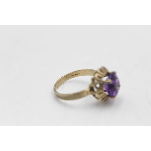 63 - A 9ct gold amethyst dress ring - approx. gross weight 2.9 grams