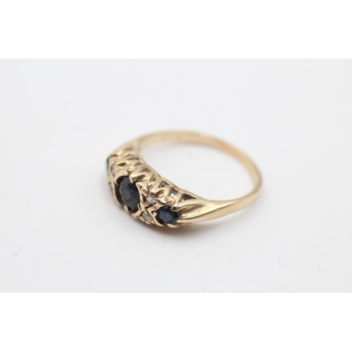 64 - A hallmarked London 9ct gold diamond and sapphire gypsy ring, size L½ - approx. gross weight 2.8 gra... 