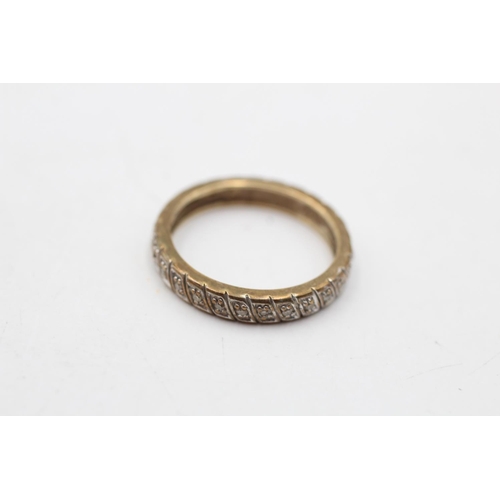 65 - A 9ct gold diamond eternity ring, size E - approx. gross weight 2.4 grams