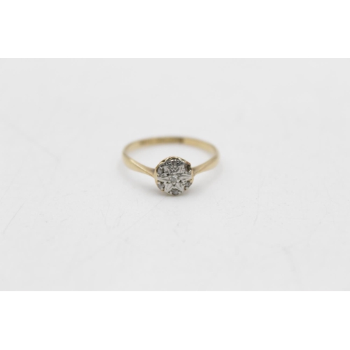 7 - An 18ct gold and platinum diamond cluster ring, size N½ - approx. gross weight 1.7 grams