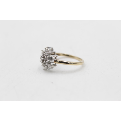 73 - A hallmarked Birmingham 9ct gold diamond starburst ring, size Q - approx. gross weight 3 grams