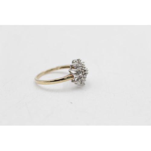 73 - A hallmarked Birmingham 9ct gold diamond starburst ring, size Q - approx. gross weight 3 grams