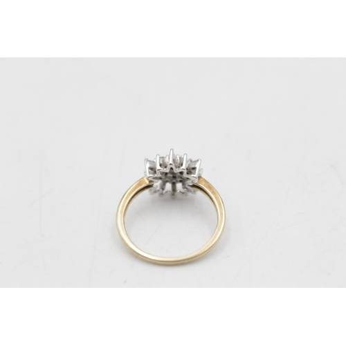 73 - A hallmarked Birmingham 9ct gold diamond starburst ring, size Q - approx. gross weight 3 grams