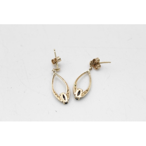 74 - Two pairs of 9ct gold gemstone and diamond drop earrings, one aquamarine and one sapphire - approx. ... 