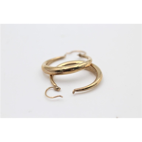 76 - A pair of hallmarked Birmingham 9ct gold hoop earrings - approx. gross weight 2.2 grams