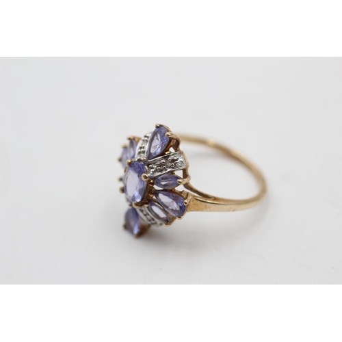 78 - A 9ct gold tanzanite and diamond dress ring, size K - approx. gross weight 2.3 grams