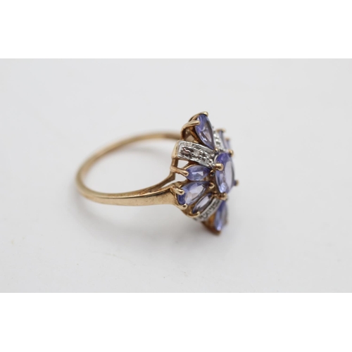 78 - A 9ct gold tanzanite and diamond dress ring, size K - approx. gross weight 2.3 grams