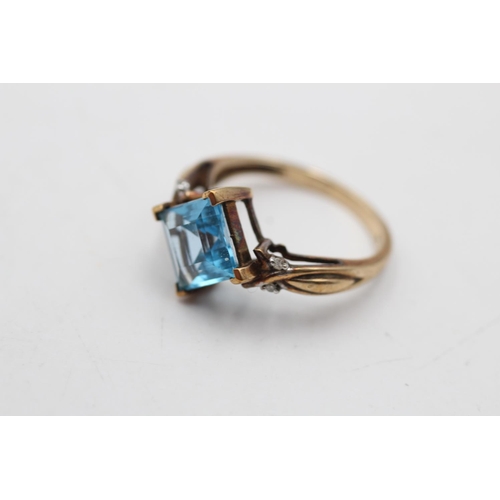 93 - A hallmarked London 9ct gold topaz and diamond shoulder ring, size P - approx. gross weight 3.2 gram... 