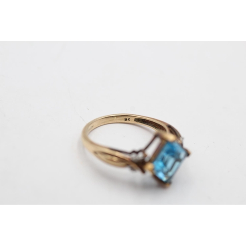 93 - A hallmarked London 9ct gold topaz and diamond shoulder ring, size P - approx. gross weight 3.2 gram... 