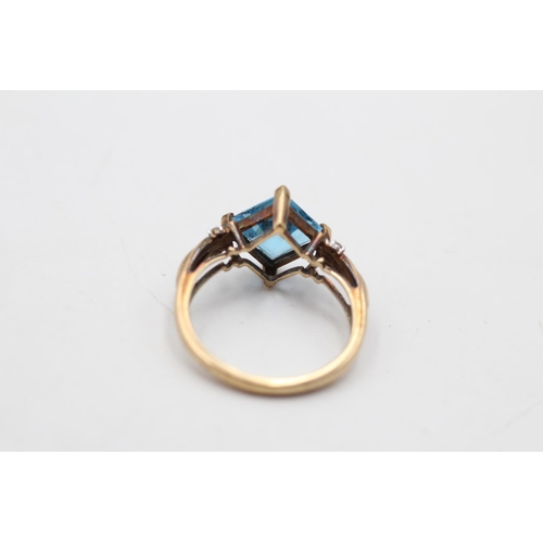 93 - A hallmarked London 9ct gold topaz and diamond shoulder ring, size P - approx. gross weight 3.2 gram... 