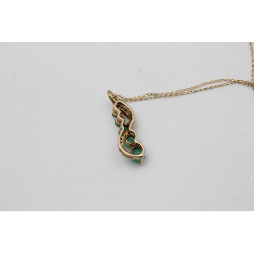 94 - A 9ct gold emerald and diamond pendant necklace - approx. gross weight 1.7 grams