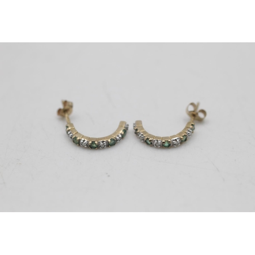 98 - Two pairs of 9ct gold gemstone and diamond earrings, one emerald half-hoop and one ruby stud - appro... 