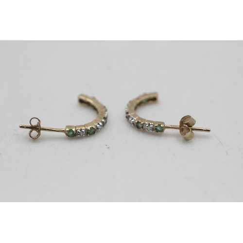 98 - Two pairs of 9ct gold gemstone and diamond earrings, one emerald half-hoop and one ruby stud - appro... 