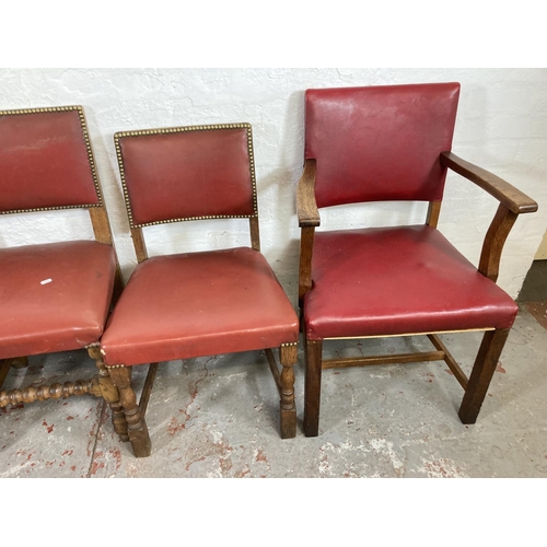 1146 - Five mid 20th century oak and red vinyl brass studded dining chairs