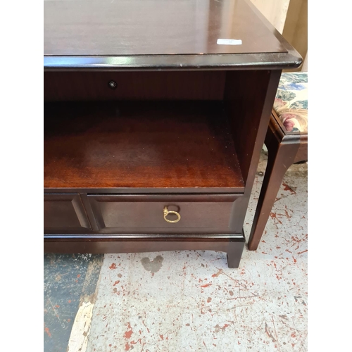 1196 - A Stag Minstrel mahogany TV cabinet - approx. 60cm high x 81cm wide x 46cm deep