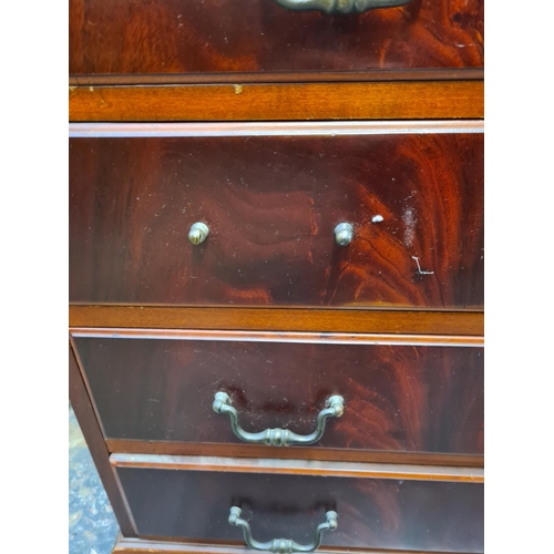 1006 - A reproduction mahogany effect bureau with four drawers and fall front - approx. 102cm high x 80cm w... 