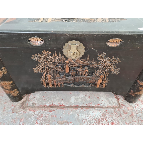 1036 - An Oriental camphor wood blanket box  - approx. 57cm high x 102cm wide x 54cm deep