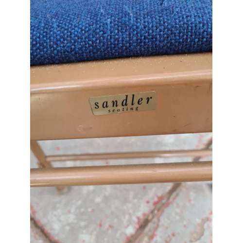 1062 - Six Sandler brown metal and blue upholstered folding chairs