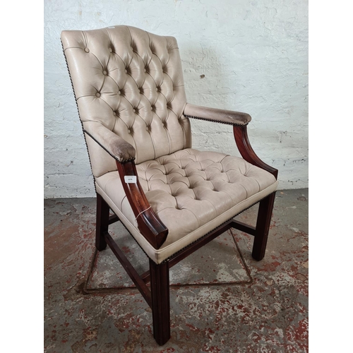 1079 - A mahogany and off white leatherette Gainsborough chair - approx. 101cm high x 65cm wide x 53cm deep