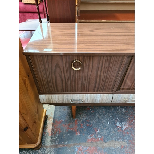 1087 - A mid 20th century melamine sideboard - approx. 73cm high x 178cm wide x 40cm deep