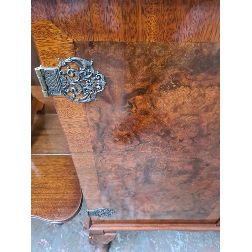 1096 - A burr walnut effect two door cabinet with cabriole supports - approx. 93cm high x 78cm wide x 46cm ... 