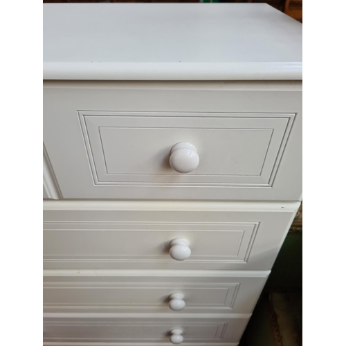 1101 - A modern white laminate chest of five drawers - approx. 118cm high x 83cm wide x 45cm deep