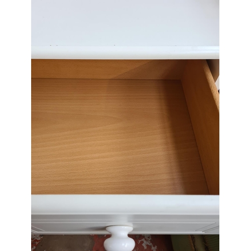 1101 - A modern white laminate chest of five drawers - approx. 118cm high x 83cm wide x 45cm deep