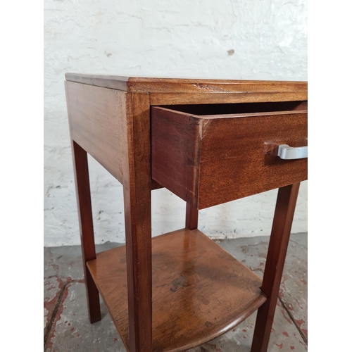 1107 - A mid 20th century mahogany single drawer two tier bedside table - approx. 70cm high x 36cm wide x 3... 