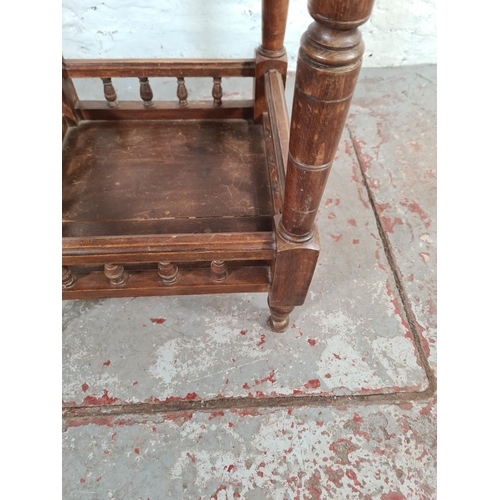 1108 - An Edwardian inlaid mahogany octagonal side table with lower galleried shelf - approx. 70cm high x 7... 