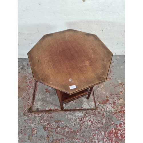 1121 - An Edwardian mahogany octagonal side table with lower galleried shelf - approx. 67cm high x 60cm wid... 